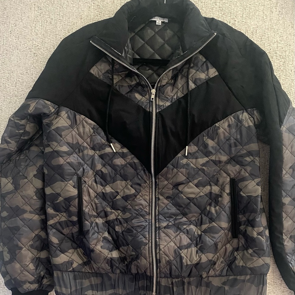 White Birch camouflage and black jacket.